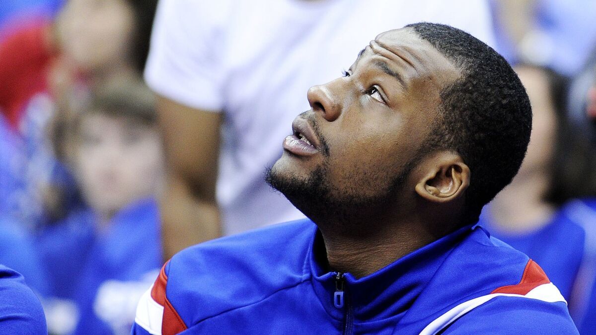 Cliff Alexander sits on the bench during a game between Kansas and Baylor during the 2015 Big 12 tournament in Kansas City, Mo. Alexander hopes to land an NBA contract before the start of the 2019-20 season.
