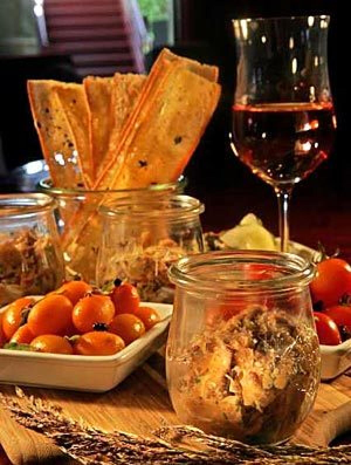 POTTED: Lamb rillettes served in a glass pot with a basket of wafer-thin toasted bread at Palate Food + Wine in Glendale.