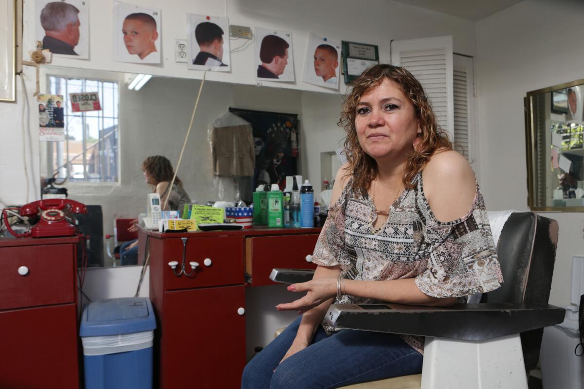 Cecilia Rios at her Echo Park Barber Shop in Los Angeles.