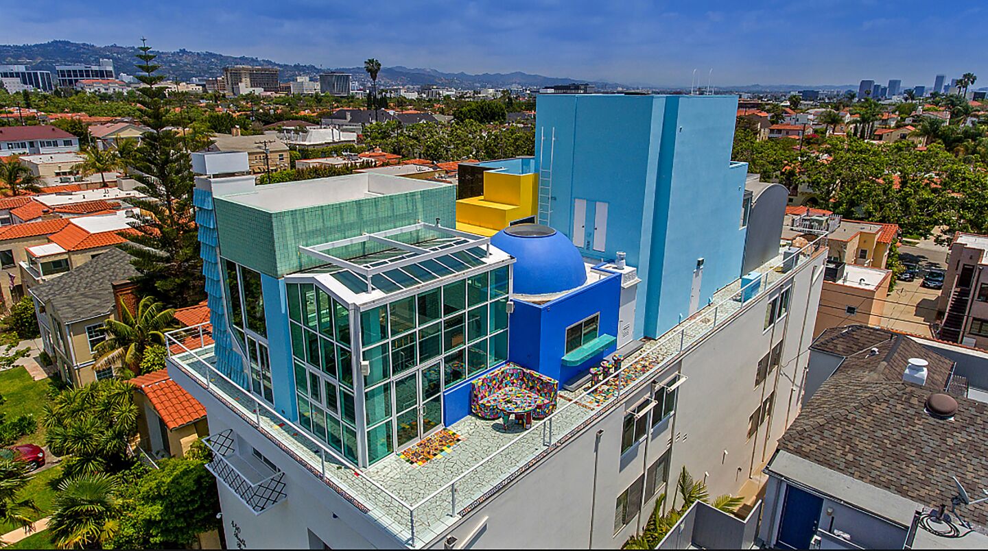 Frank Gehry's influences can be seen in the home's unusual shapes and forms, which were designed to evoke a small city.