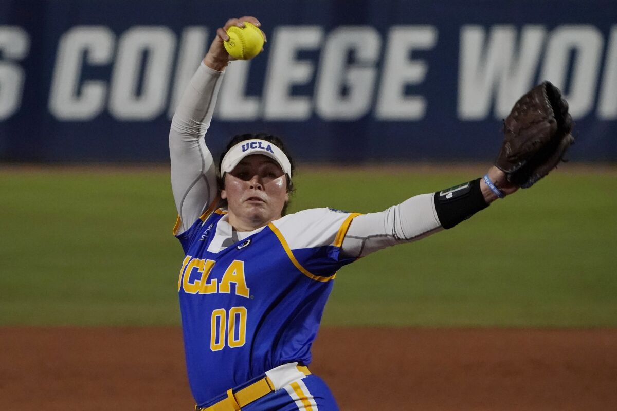 UCLA's Rachel Garcia pitches in the first inning.