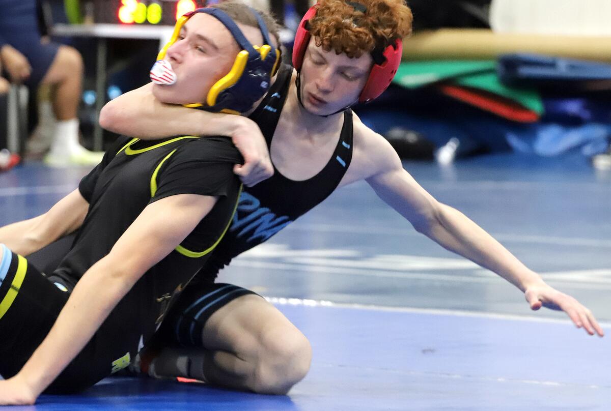 Marina's Seven Stites against Channel Islands' Jaiden Appel in the 120-pound match in the CIF Division 5 Duals.