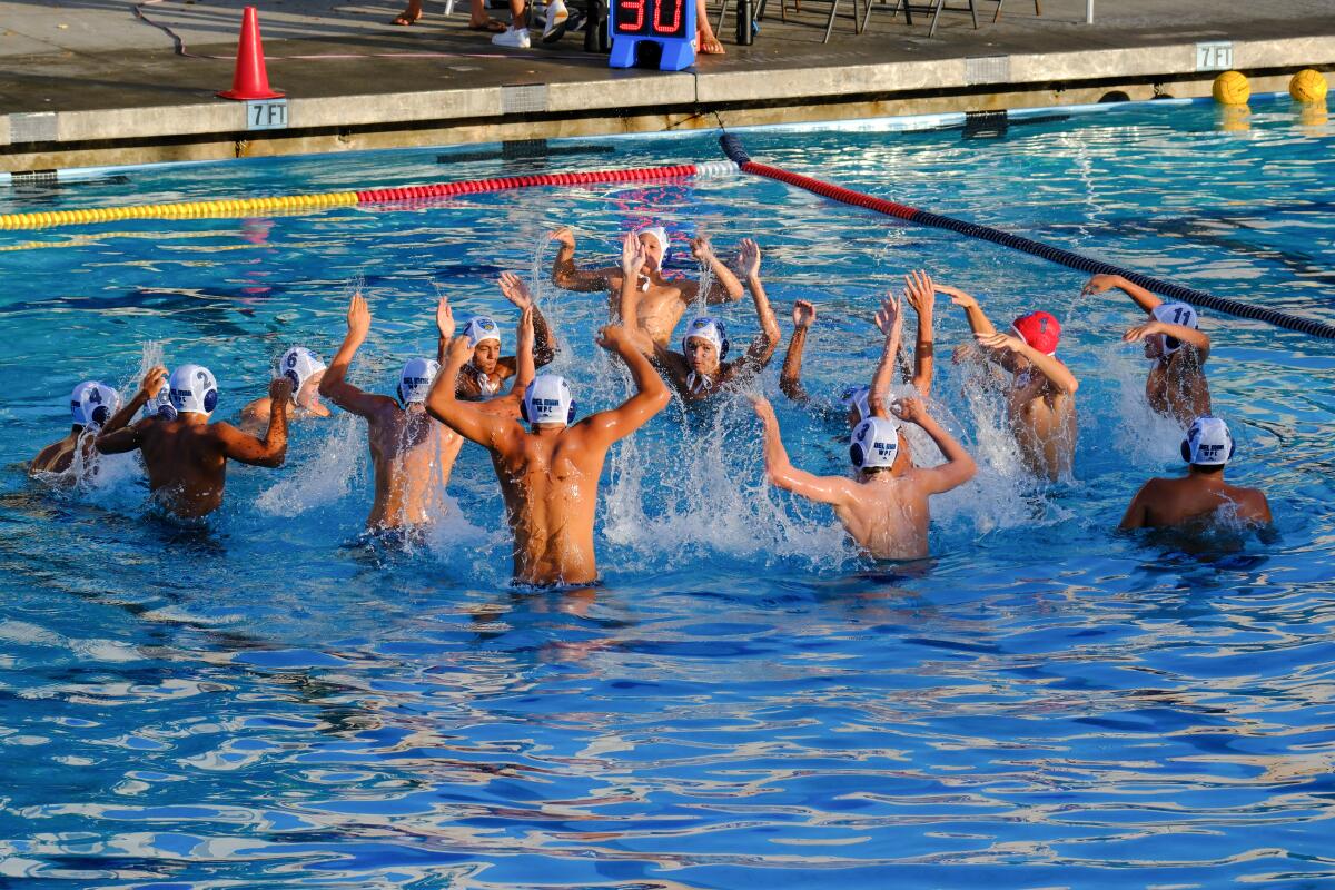 Del Mar Water Polo Club 14-&-under boys get hyped prior to the Championship match.