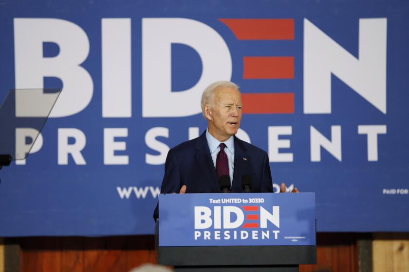 Democratic presidential candidate former Vice President Joe Biden speaks to local residents during a community event, Wednesday, Aug. 7, 2019, in Burlington, Iowa. (AP Photo/Charlie Neibergall)