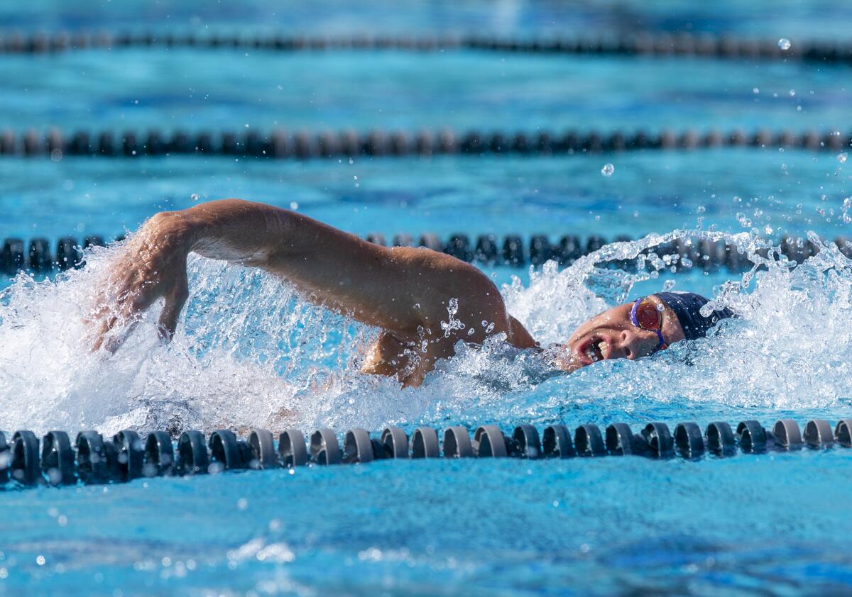 Corona del Mar's Makar Briggs swims the 200 freestyle during the annual Battle of the Bay match at Newport Harbor on Tuesday.