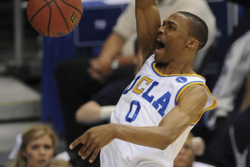 UCLA's Russell Westbrook dunks against Xavier.