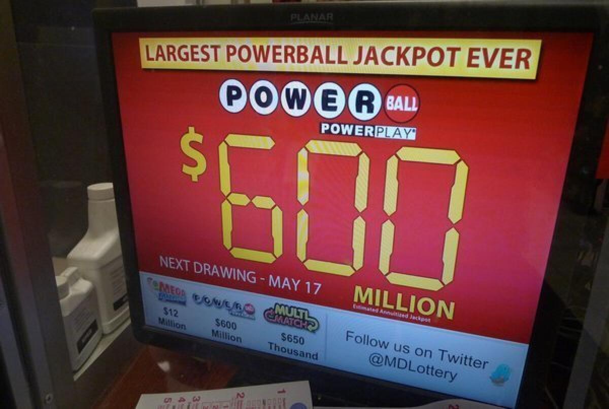 A monitor at a Bethesda, Md., gas station shows the expected jackpot for Saturday's Powerball drawing.