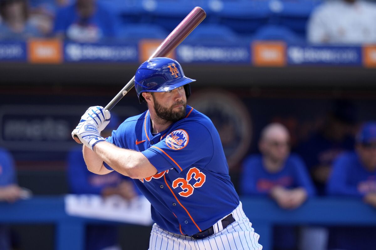 FILE - New York Mets' Darin Ruf bats during an exhibition baseball game against Venezuela, March 9, 2023, in Port St. Lucie, Fla. Ruf was cut Monday, March 27, 2023, by the Mets as the team set its opening day roster, ending his brief stint in New York following a failed trade. (AP Photo/Lynne Sladky, File)