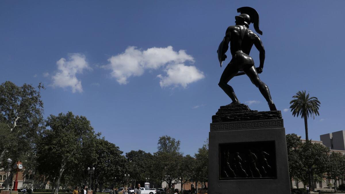 Tommy Trojan, USC's campus symbol, has seen better times.
