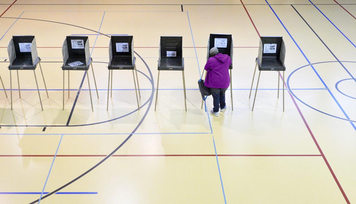 A woman votes in Durham, N.C., in the November midterm election.