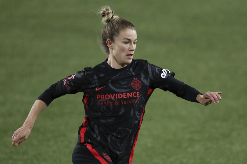 Portland Thorn's Christen Westphal (18) plays during the second half of an NWSL Challenge Cup soccer match against Kansas City, Friday, April 9, 2021, in Portland, Ore. (AP Photo/Amanda Loman)