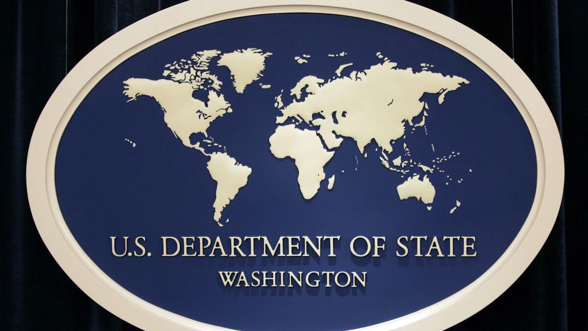 A State Department employee has pleaded not guilty to charges that she made false statements to the FBI.
