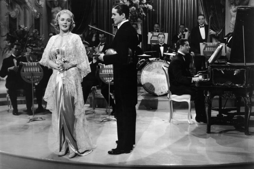 Alice Faye and Tyrone Power in "Alexander's Ragtime Band," a musical featuring songs by composer Irving Berlin, 1938.