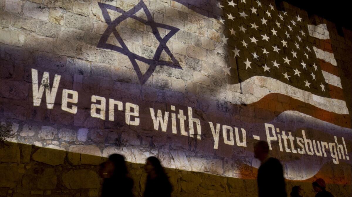 A projection on the Old City wall on Oct. 28, 2018, in Jerusalem honors the victims of the deadly shooting at a Pittsburgh synagogue.
