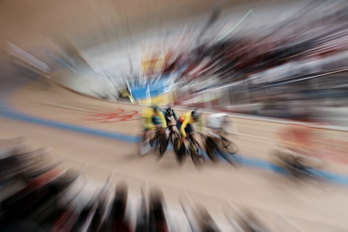 Athletes compete during the track cycling women's keirin at the 2020 Summer Olympics, Wednesday, Aug. 4, 2021, in Izu, Japan. (AP Photo/Thibault Camus)
