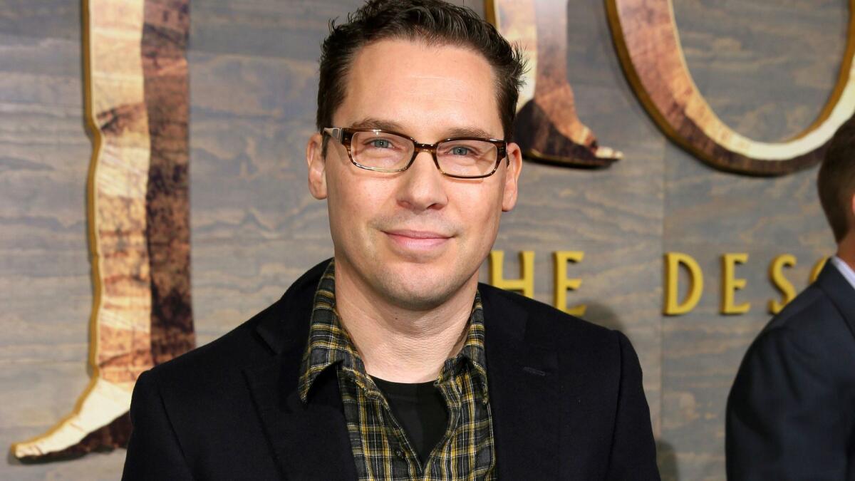 Director Bryan Singer, who has left the Queen biopic "Bohemian Rhapsody" in the middle of production, faces a lawsuit over alleged sexual assault of a teen in 2003.