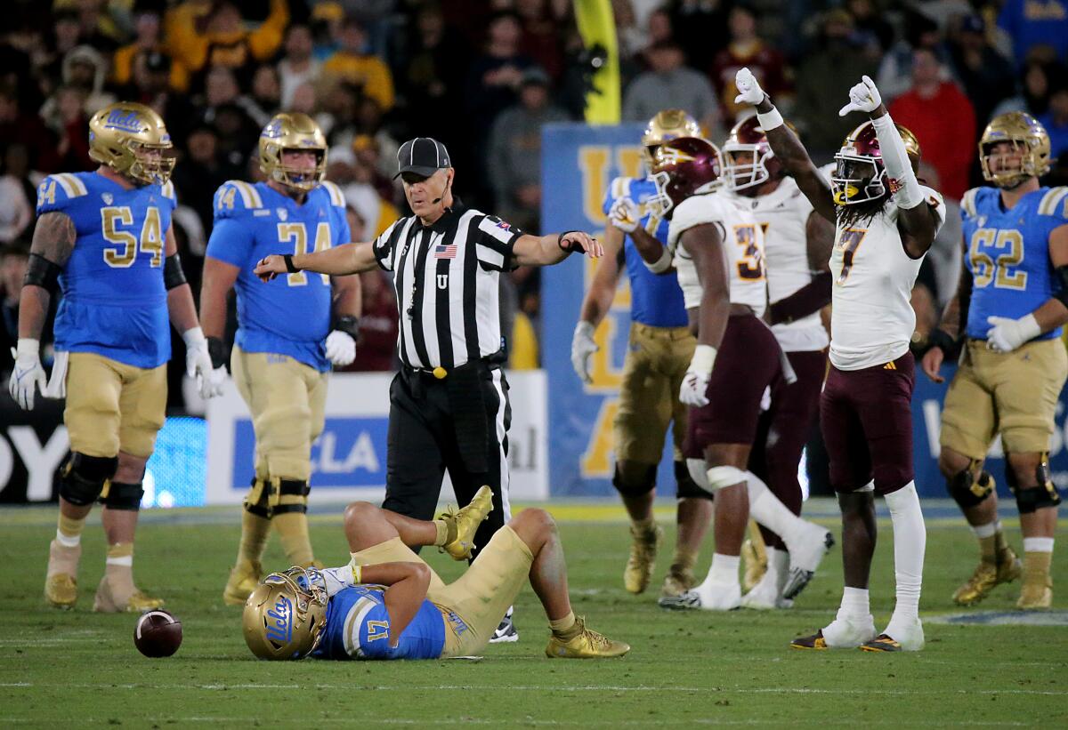 UCLA wide receiver Logan Loya reacts after dropping a pass against Arizona State in the second half.