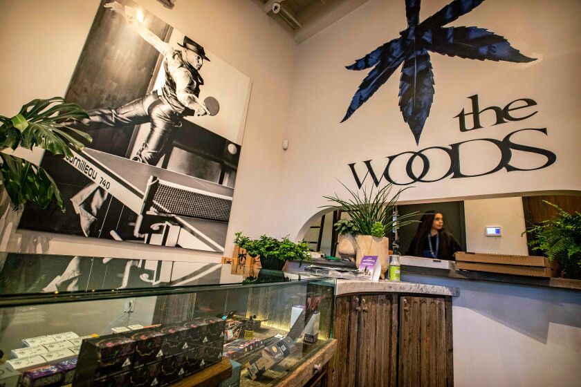 WEST HOLLYWOOD, CA - NOVEMBER 09, 2022 - A corner of the interior of the Woods dispensary, November 09, 2022, in West Hollywood. Hanging on the wall is a picture actor Woody Harrelson, who is one of the backer of the place. (Ricardo DeAratanha / Los Angeles Times)