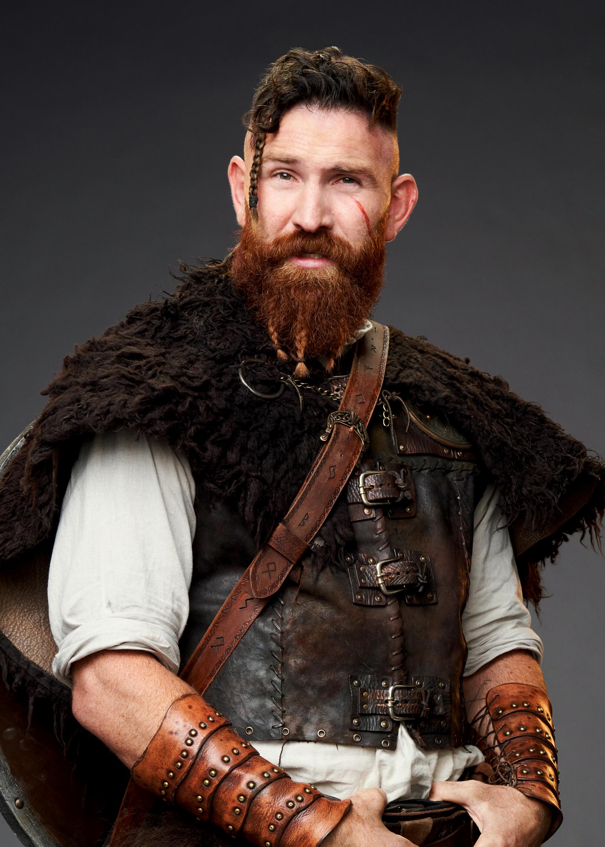 Devan Long as Thorfinn, wears Viking garb