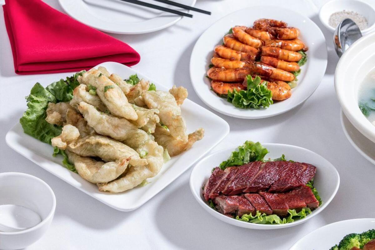 Seaweed-flavored fried fish, left, is one of the restaurant's best seafood dishes.