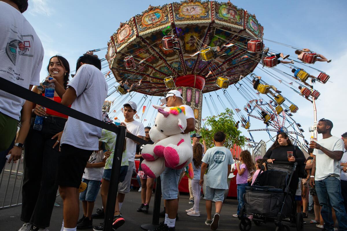 People enjoy a Sunday at the Orange County Fair in 2021.