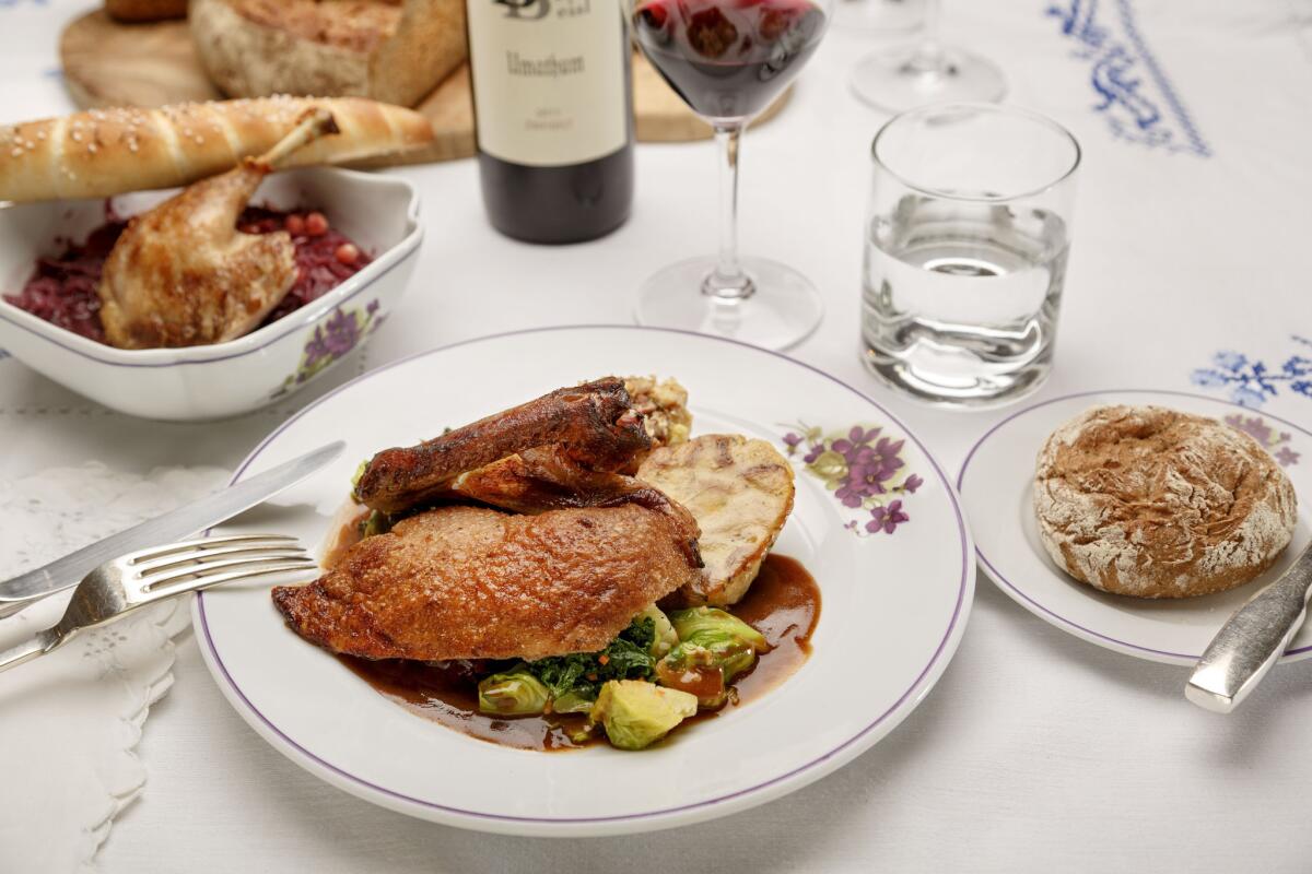 Roast duck is the star of this Christmas meal. Also on the menu: braised red cabbage.