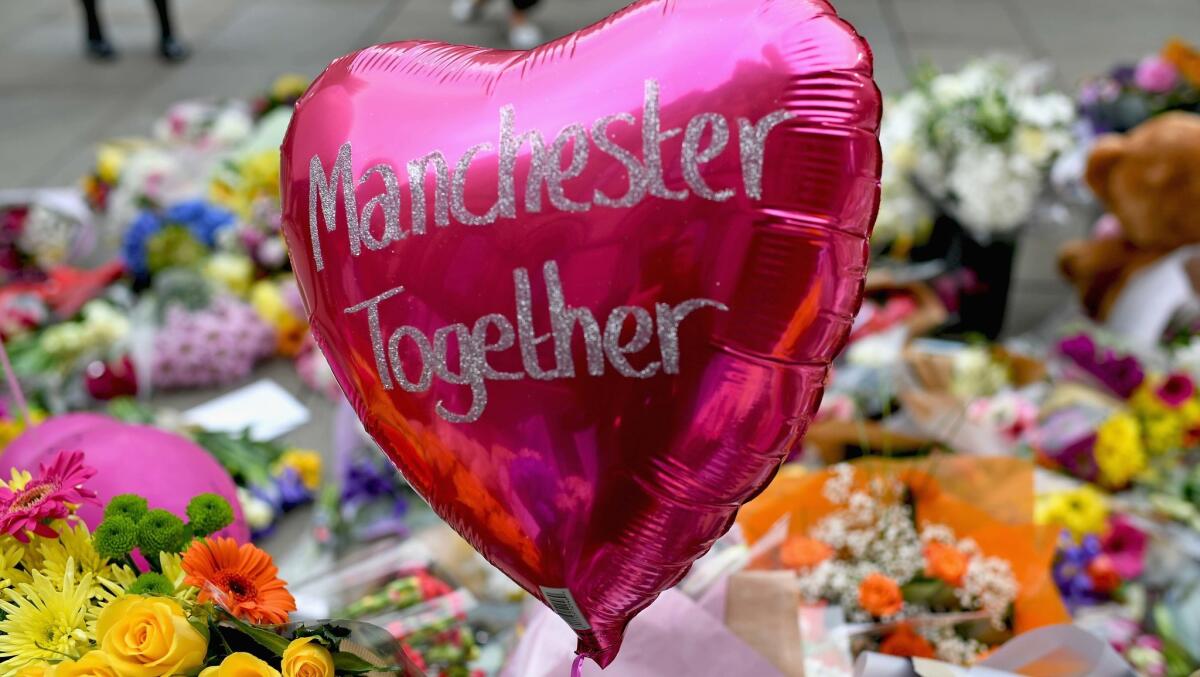 Floral tributes and messages were left in St. Ann's Square in Manchester, England, in the days after the suicide attack.