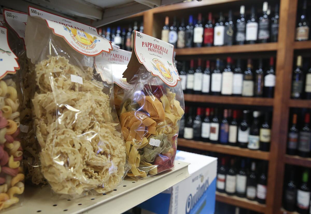 Imported pastas and fine wine at Leo and Teresa Razo's Villa Roma restaurant and market in Laguna Hills.