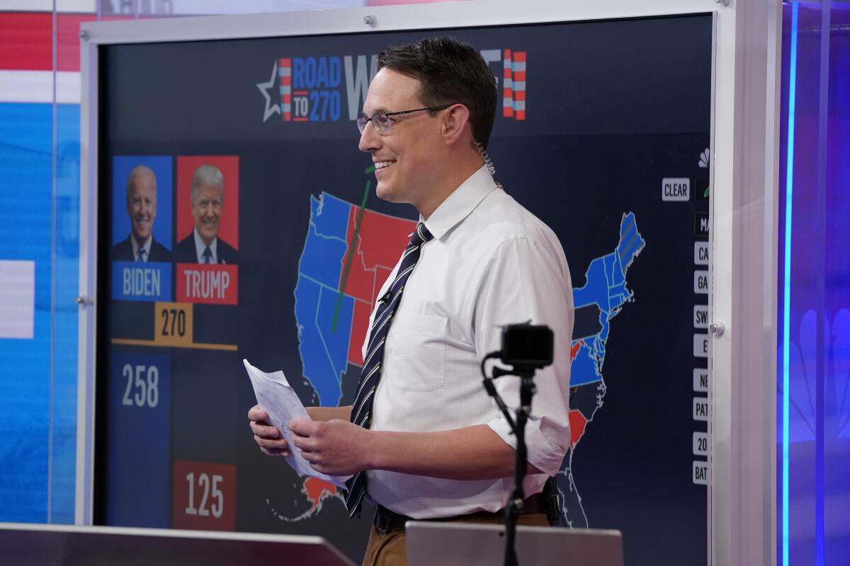 Steve Kornacki standing in front of his MSNBC election map