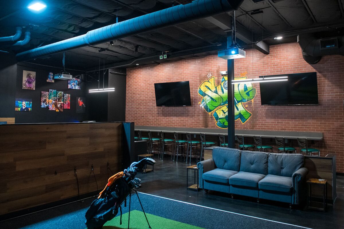 The space with two simulators that can be reserved for private events is dubbed “Suite 54” at The Golf Bar in Rancho Bernardo