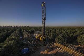 Terra Bella, CA - October 14: Matt Davis's company drills a 1300 feet deep well in an orchard at Setton Farms on Thursday, Oct. 14, 2021 in Terra Bella, CA. (Irfan Khan / Los Angeles Times)