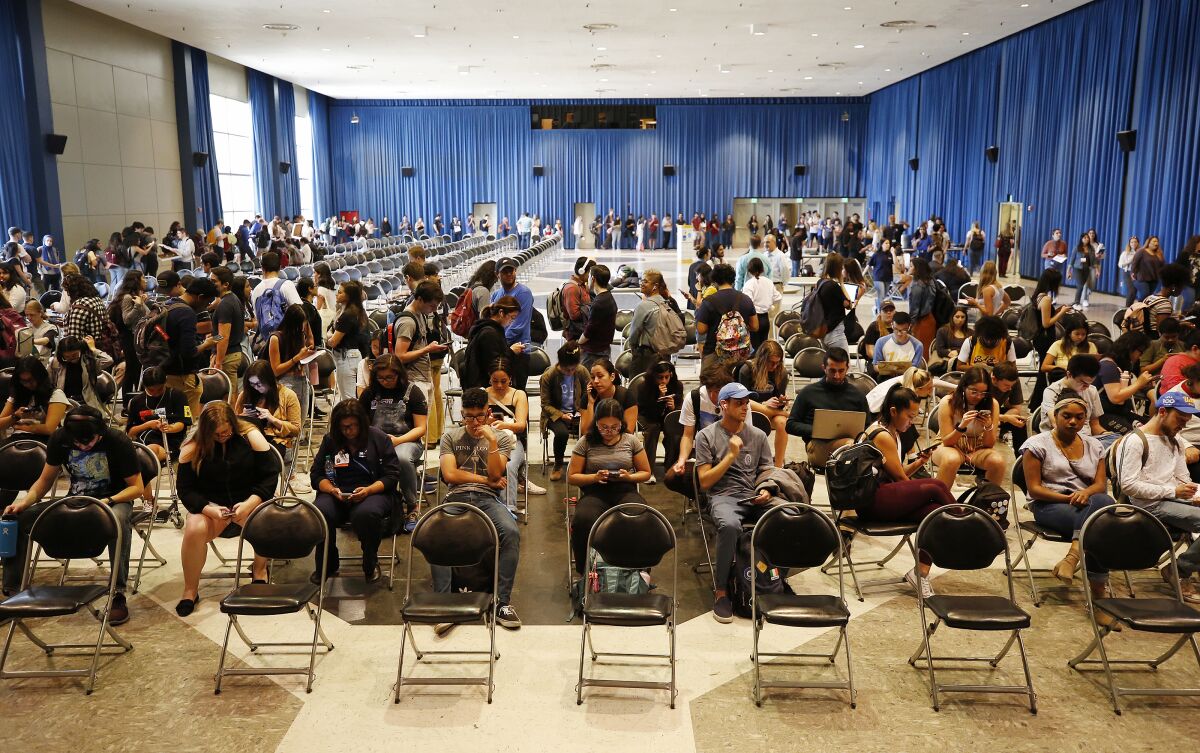Hundreds of UCLA students waited for hours in line before being able to vote using new machines at the UCLA Ackerman Student Union on March 3.