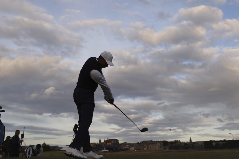 Tiger Woods plays from the 17th tee in the first round of the British Open on Thursday.
