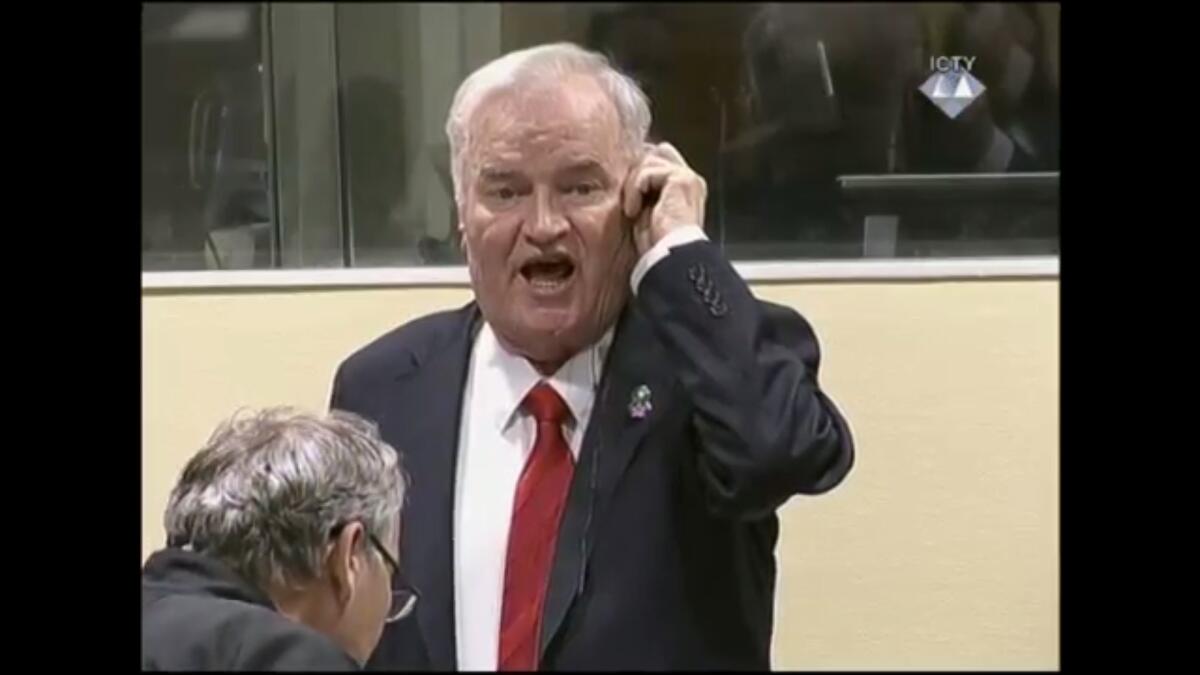 A screen grab from video provided by the International Criminal Tribunal for the Former Yugoslavia shows former Bosnian Serb military chief Ratko Mladic shouting at the presiding judge in The Hague on Nov. 22, 2017.