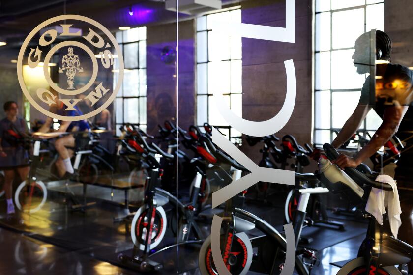 HOLLYWOOD-CA-JULY 17, 2024: Members workout at Gold's Gym in Hollywood on July 17, 2024. (Christina House / Los Angeles Times)