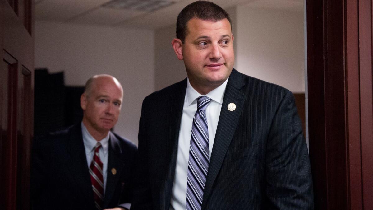 Rep. David Valadao (R-Hanford), right, finds himself in an increasingly harrowing cliffhanger against Democrat TJ Cox.