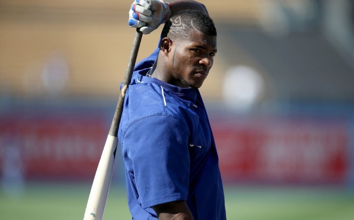 Dodgers outfielder Yasiel Puig gets ready for batting practice before a game on May 17 at Dodger Stadium.