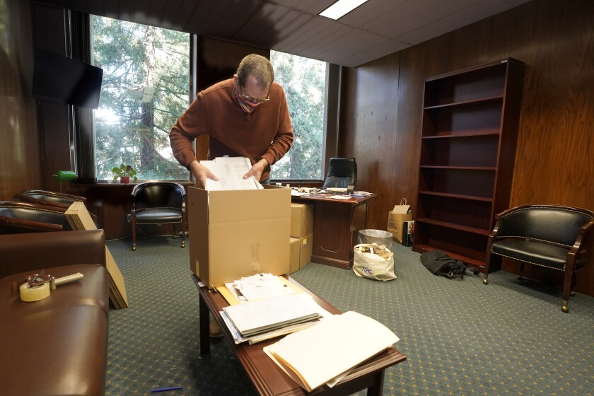 Dan Savage, chief of staff for Assemblyman Adrin Nazarian, D-Sherman Oaks, packs a box.