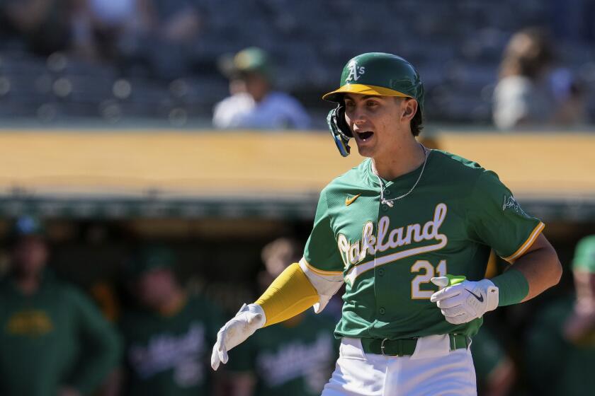 Oakland Athletics' Tyler Soderstrom celebrates after hitting a two-run home run against the Texas Rangers during the fourth inning in the second baseball game of a doubleheader Wednesday, May 8, 2024, in Oakland, Calif. (AP Photo/Godofredo A. Vásquez)