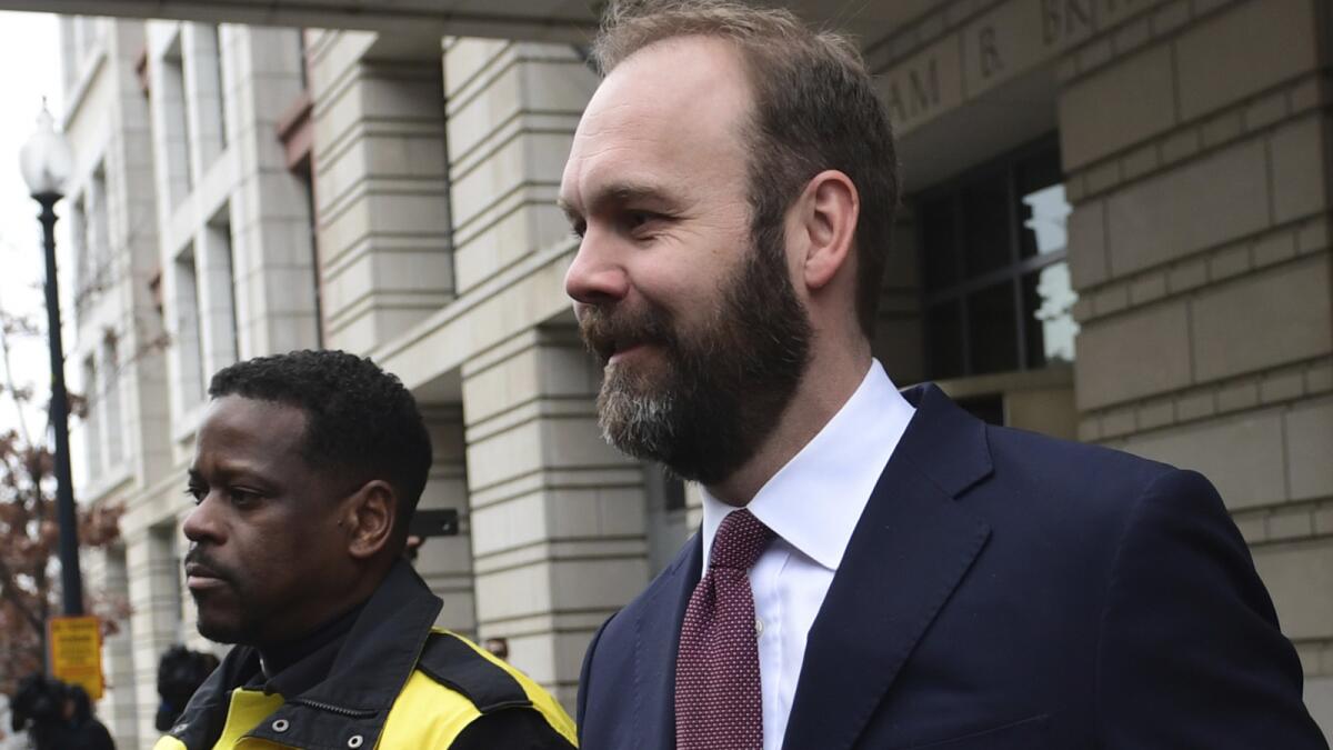 Rick Gates leaves federal court in Washington, D.C., after his plea.