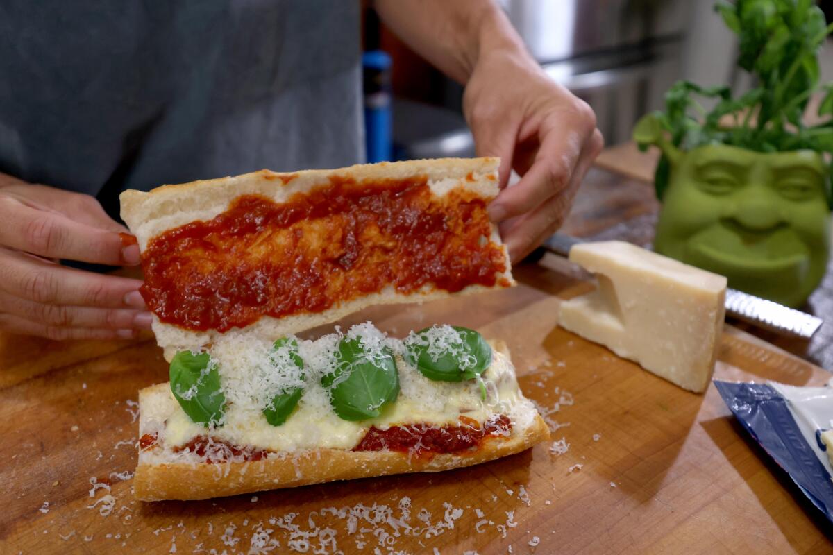 Putting together a meatball sandwich in Owen Han's kitchen in Venice.