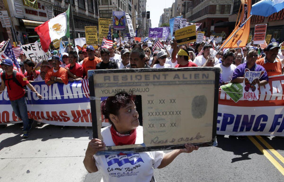 Marchers at a May Day rally this month show support for comprehensive immigration reform.