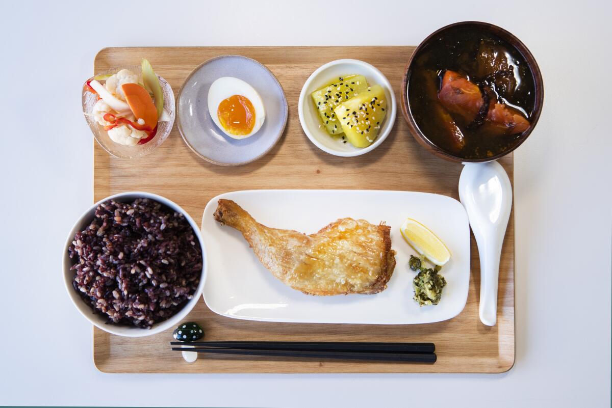 Yang’s set meal with fried chicken leg, one of three protein options.