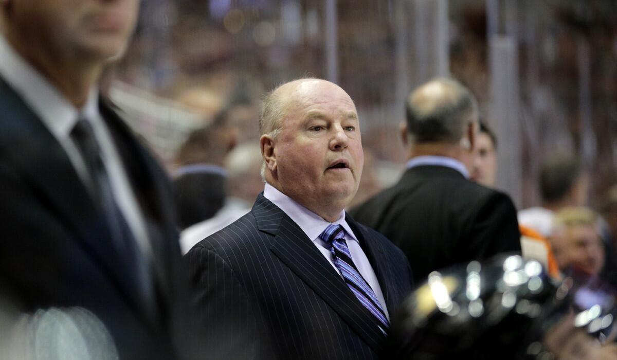 Anaheim Ducks Coach Bruce Boudreau watches during the first period of a preseason game against the San Jose Sharks on Oct. 3.