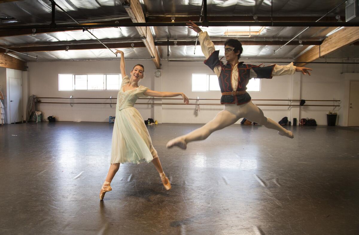 Alyssa Bross and Kenta Shimizu rehearse "Romeo and Juliet" at the Los Angeles Ballet studio in Los Angeles.