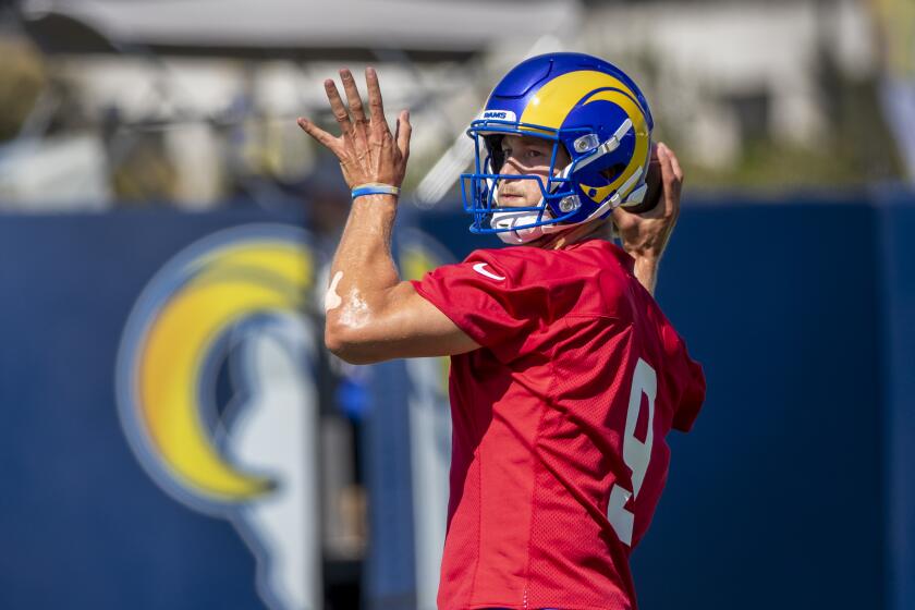 IRVINE, CA - JULY 28, 2021: Rams starting quarterback Matthew Stafford looks to pass.