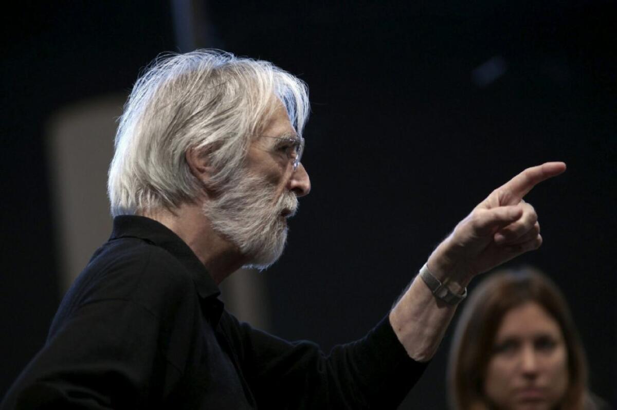 Michael Haneke, the Oscar-nominated director of "Amour," is shown during a recent rehearsal of his production of Mozart's "Cosi Fan Tutte" in Madrid.