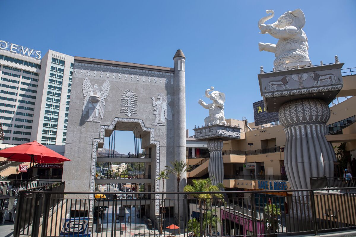 Elephant topped columns and an arch with Babylonian images at Hollywood & Highland shopping in Aug. 2020