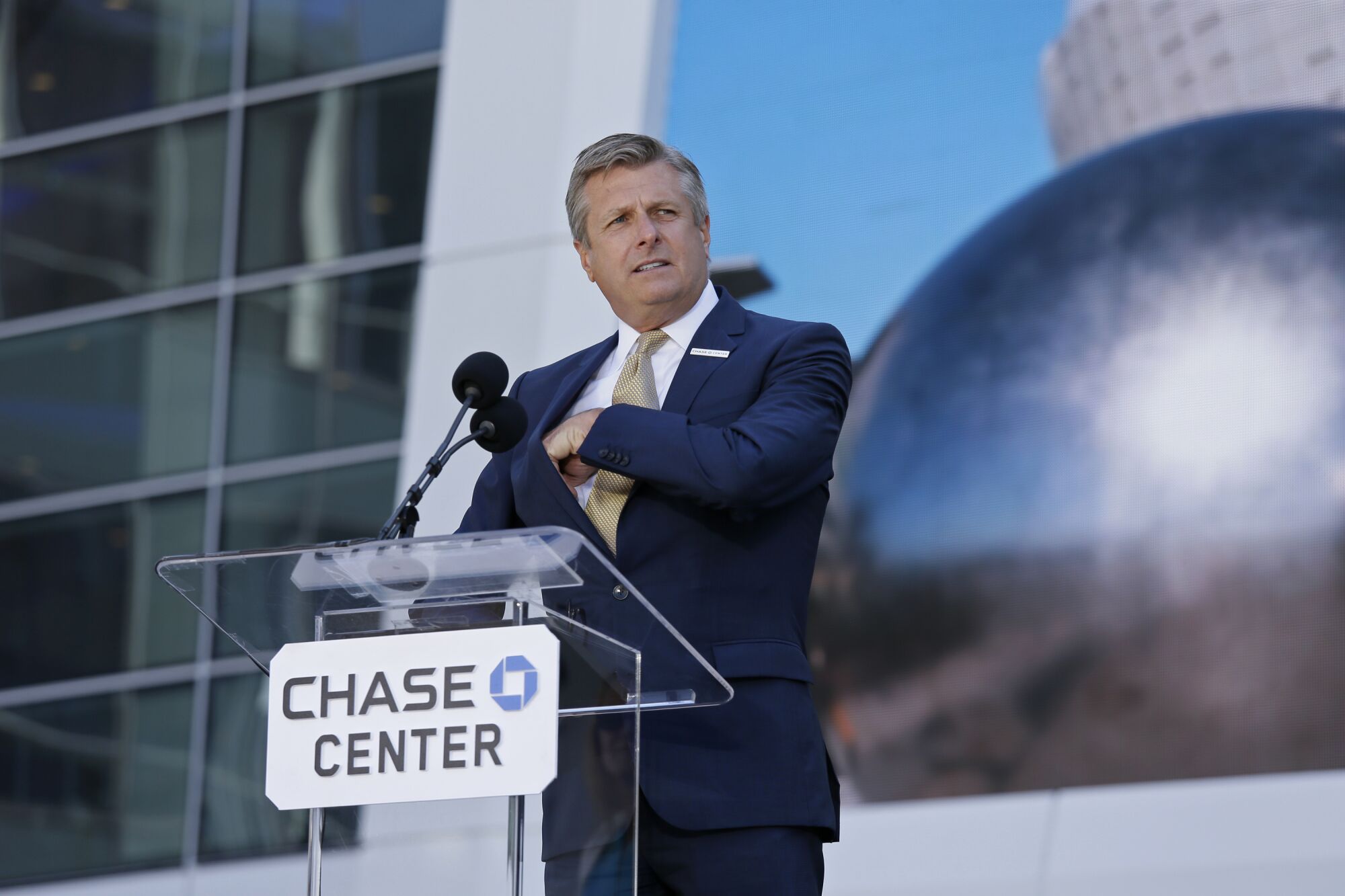 Warriors chief executive and president Rick Welts prepares to speak at the ribbon-cutting ceremony for Chase Center.
