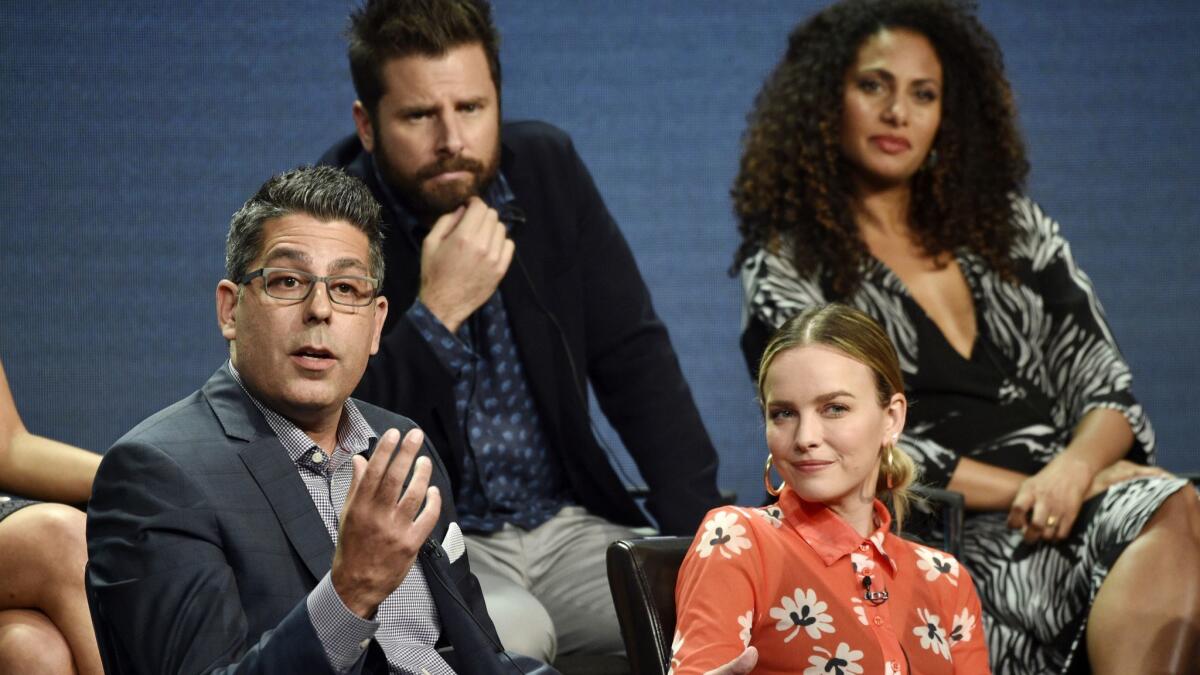 DJ Nash, left, creator and executive producer of the Disney ABC television series "A Million Little Things," answers a question as cast members, from left, James Roday, Allison Miller and Christina Moses look on during the 2018 Television Critics Association Summer Press Tour.